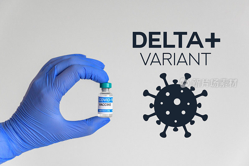 医务工作者拿着白色背景上印有delta plus变体文字的covid疫苗瓶
